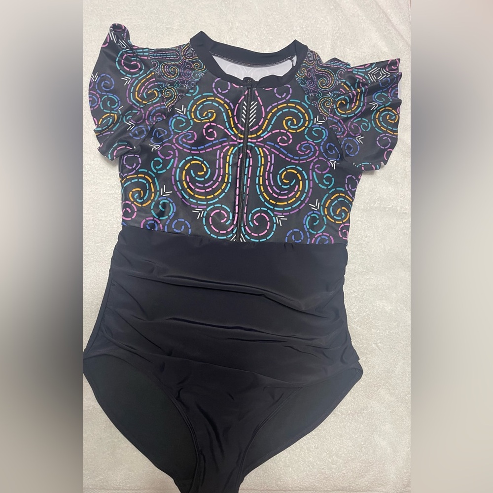 One piece zipper front bathing suit.
